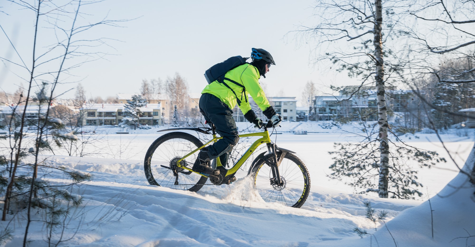 Biker on a snowy path.